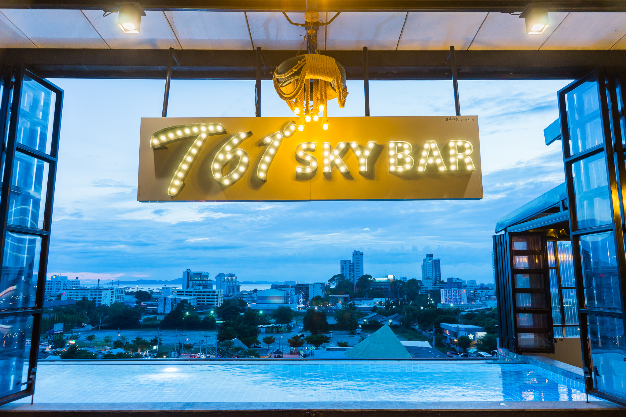 Rooftop infinity swimming pool at T Pattaya Hotel with city views