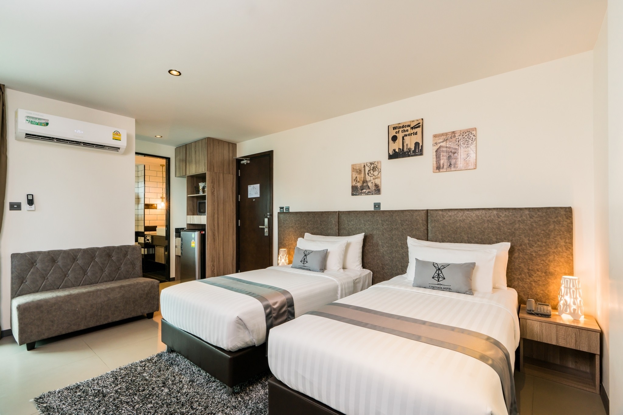 Deluxe Room at T Pattaya Hotel — spacious layout with city views