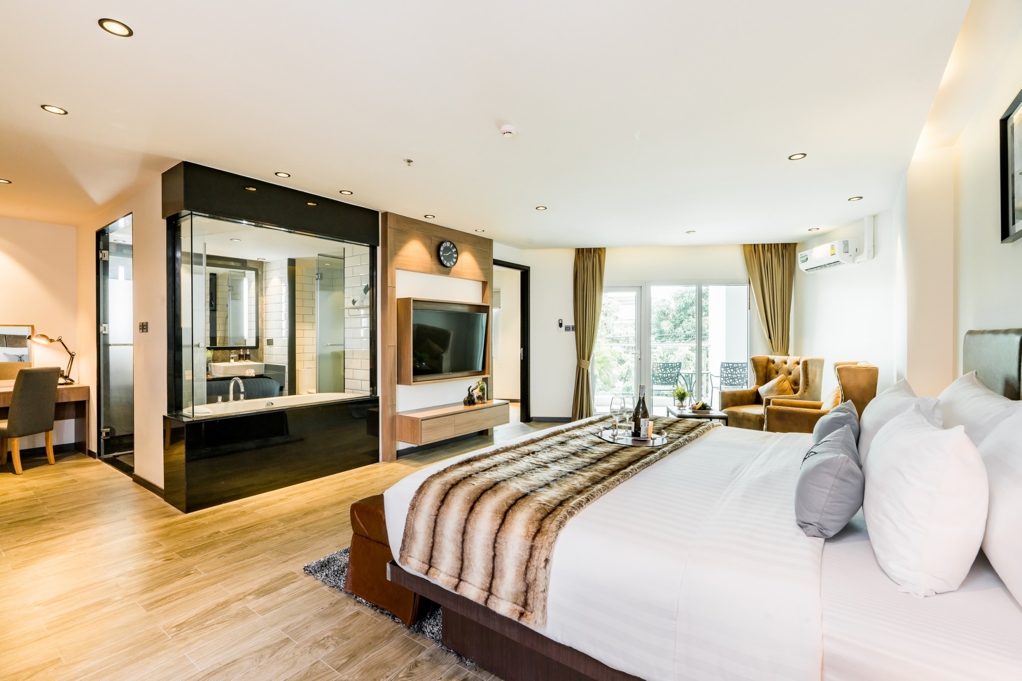 Junior Suite at T Pattaya Hotel — separate living area with premium furnishings